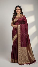 Beautiful lady wearing deep maroon Banarasi silk saree with golden zari